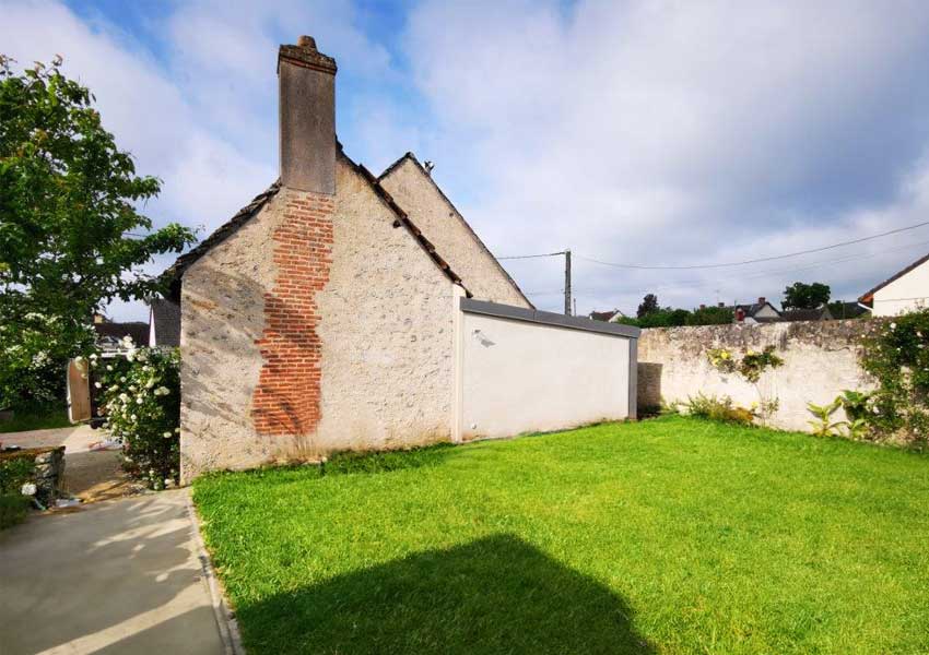 Une extension moderne sur une maison ancienne